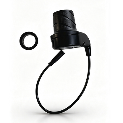 ZorixBike Throttle A black cylindrical electronic device with a textured grip, connected by a curved cable to a small black ring, shown on a clean white background.