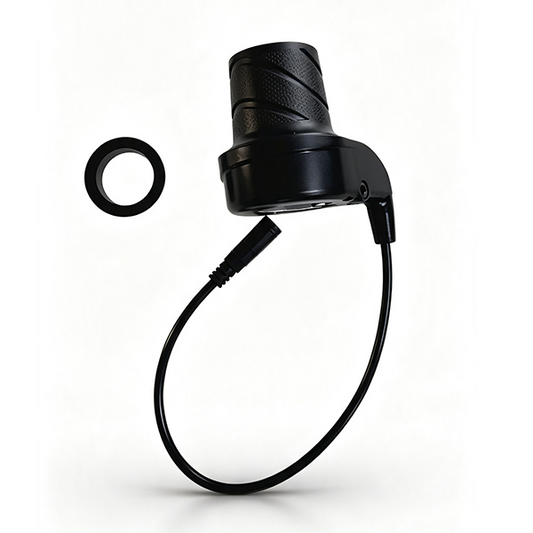 ZorixBike Throttle A black cylindrical electronic device with a textured grip, connected by a curved cable to a small black ring, shown on a clean white background.